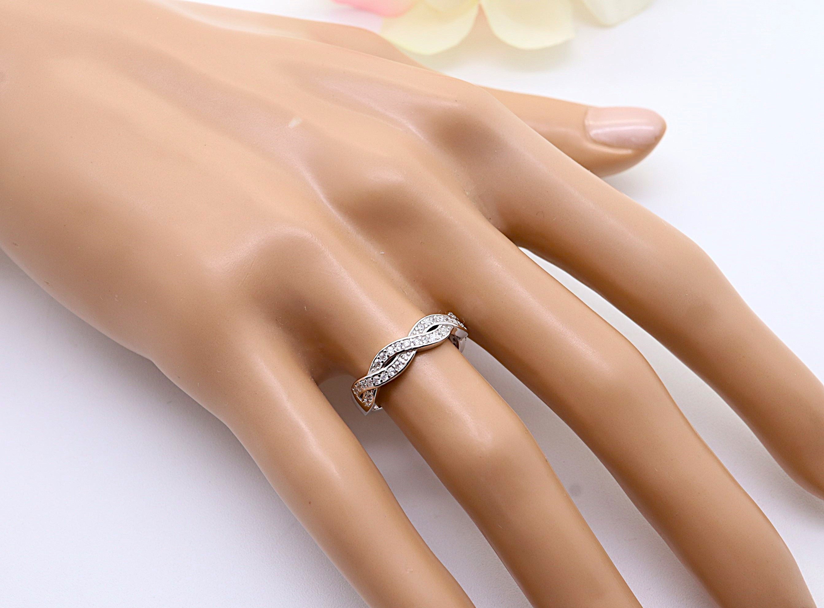 Anillo Plata 925mls Trenzado con Circonitas blancas