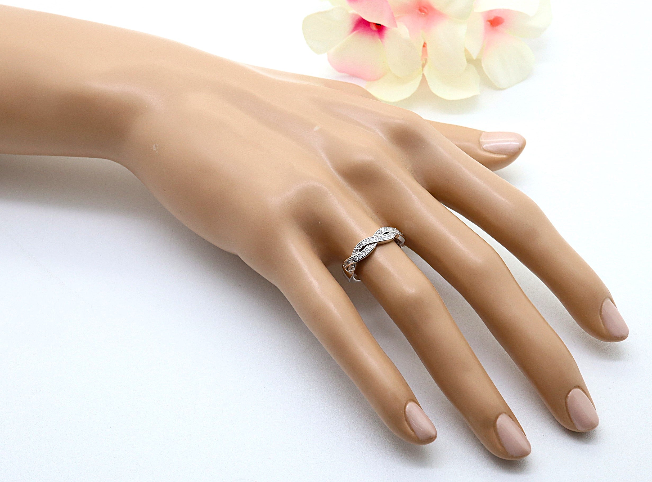 Anillo Plata 925mls Trenzado con Circonitas blancas