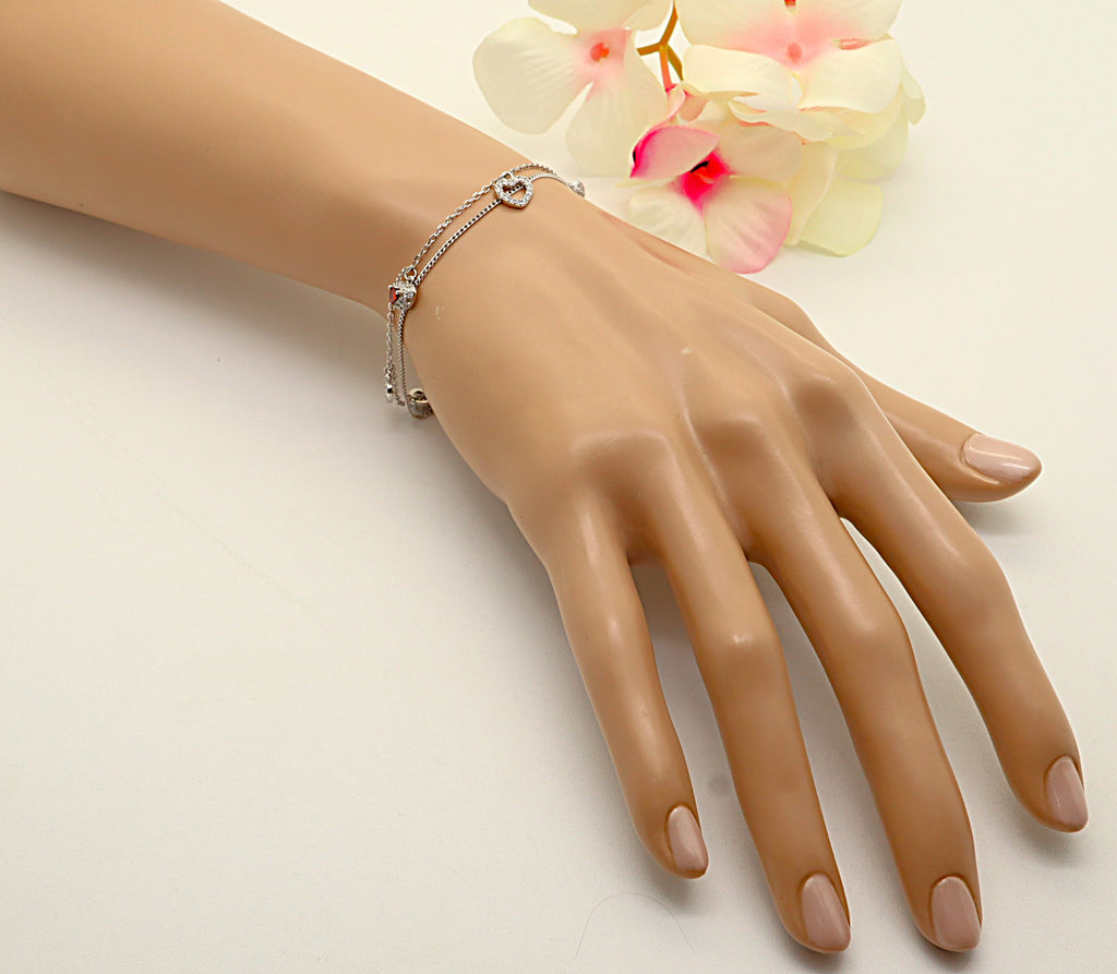Pulsera Plata 925mls con Cinco Corazones y Circonitas | Elegancia Romántica y Brillo Total