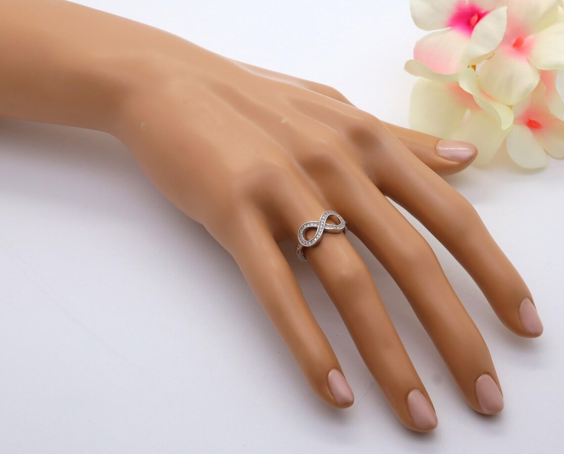 Anillo Plata 925mls Infinito con Circonitas blancas | Joyería Fina