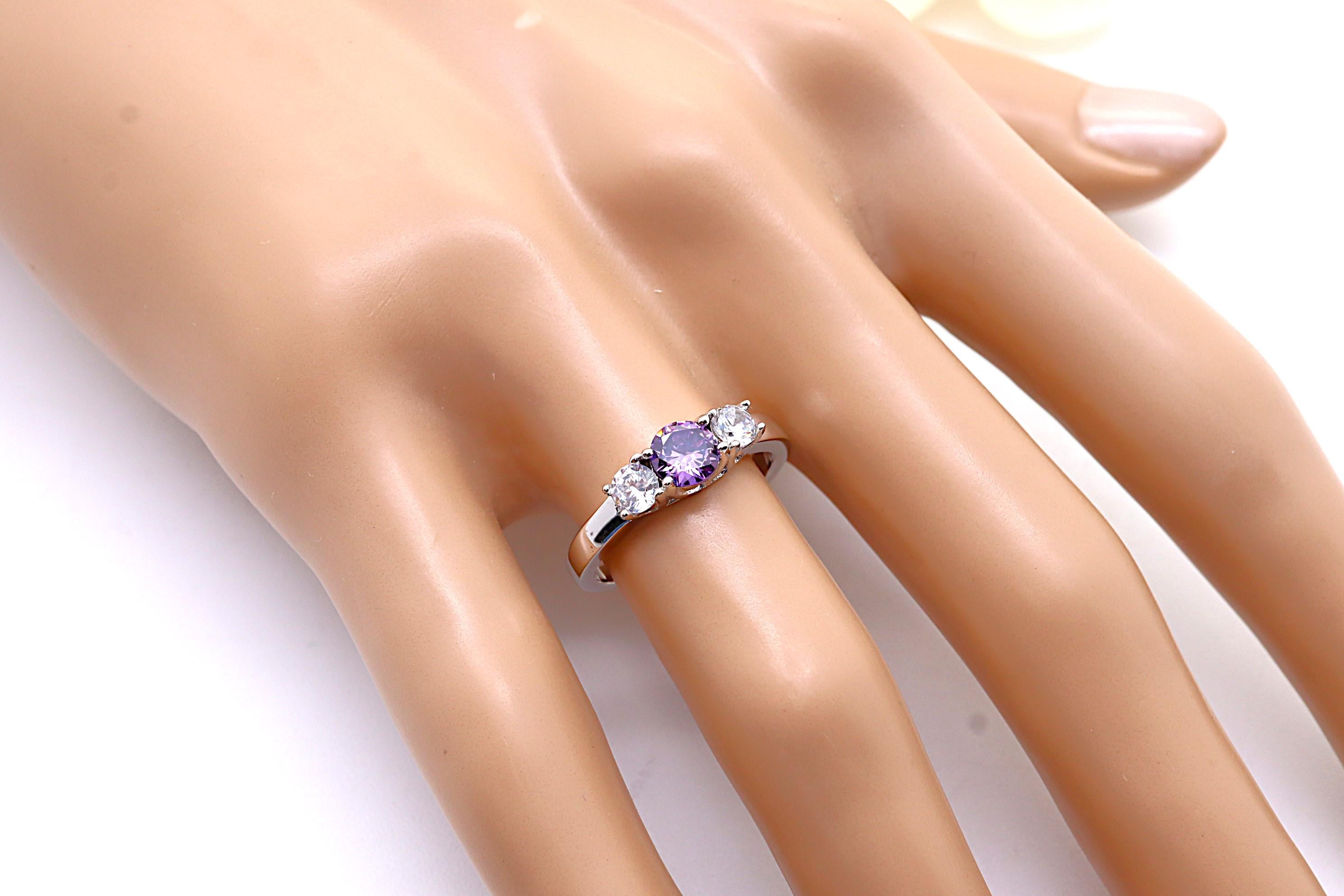 Anillo Plata 925mls 3 Circonitas púrpura y blancas